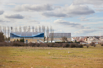 Solar panels for a sports center and indoor swimming pool