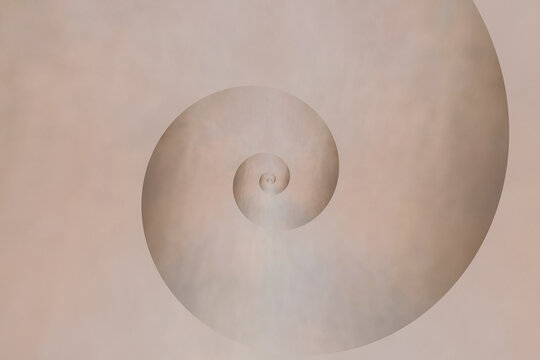 eine Spirale w&ouml;lbt sich aus einem beigen  Hintergrund hervor - abstrakt