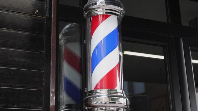 Barber Pole Retro Swirl Sign at Hairdresser Shop