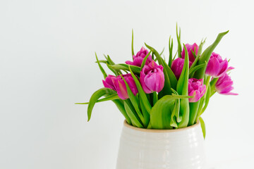 Bouquet of purple tulips in a vase