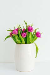 Bouquet of purple tulips in a vase