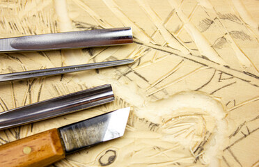 Woodcarving. Cutters for woodcarving. Carved close-up.