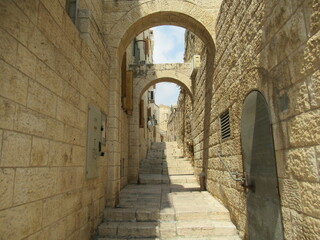 Fototapeta na wymiar Archway and steps in the Old City of Jerusalem, Israel
