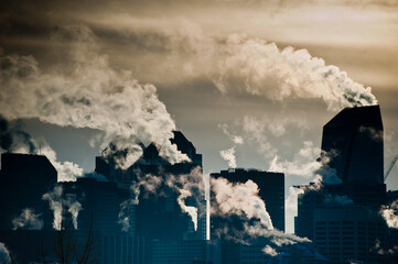 Fototapeta na wymiar Steam in the city sky