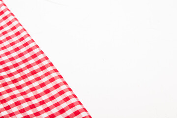 checkered napkin on the white background, picnic.with space for text