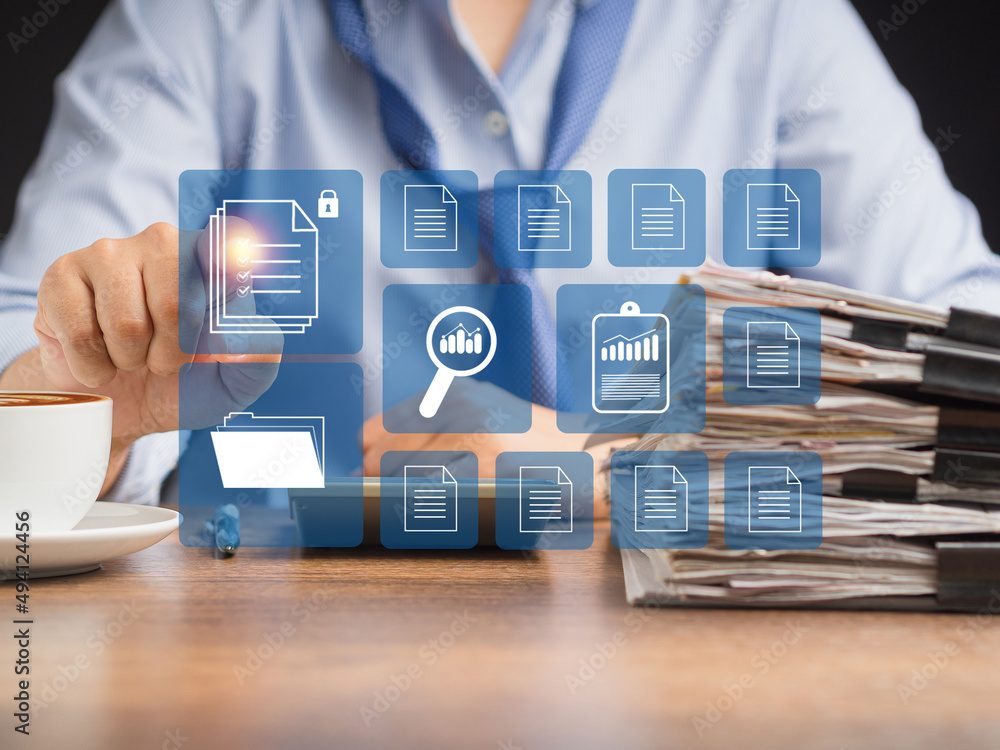 Poster businessman in a blue shirt working at digital documents with checkbox lists on virtual screen