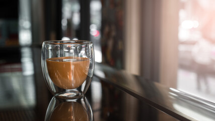 cup of coffee on black table in cafe