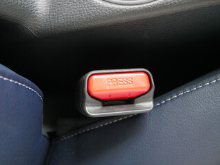 Car Seatbelt Buckle in Red Color Close Up