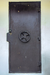 The steel door with revolving lock installed in the building.