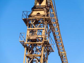 Crane. Construction crane. Huge crane against blue sky. Self-erection crane. Tower crane. Ust-Kamenogorsk (kazakhstan)