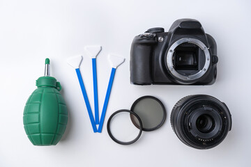 Tools for cleaning the sensor and lens of a DSLR camera