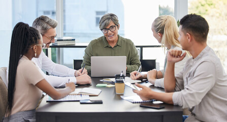 Im really loving this feedback. Shot of a team of business people having a meeting.
