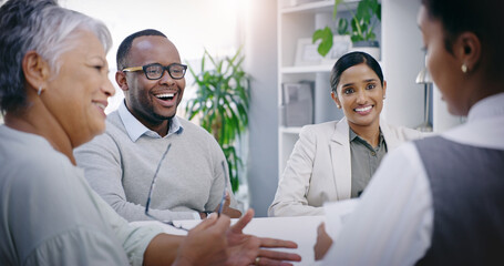 Putting business on the table. Shot of a group of businesspeople having a meeting in a modern office.