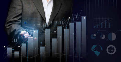 a man in a black suit holds a miniature cart against the background of a holographic graph with increasing indicators. Growth in business sales, high margins. Big profit