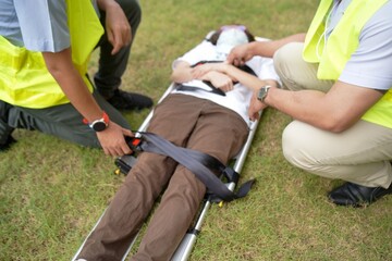 A blurred of patient, Nurse team moving and lifting demonstration. First aid training and move...