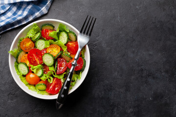 Fresh salad with tomato and cucumber