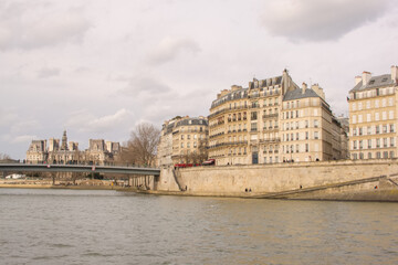 Fototapeta na wymiar View of Île Saint-Louis and Pont Saint-Louis in Paris, France