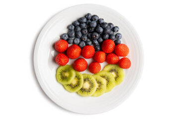 Mixed fruit in white plate isolated on white background. clipping path