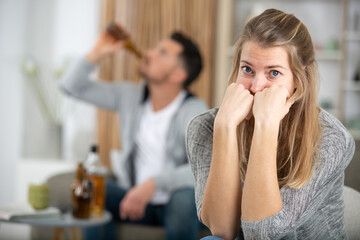 drunk man suffering from alcoholism and wifestressed