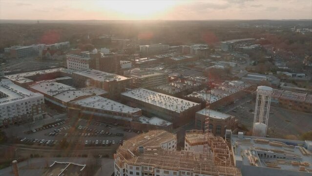 Construction site in Durham downtown, North Carolina in US. Aerial panoramic view. Sunset