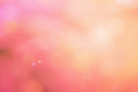 Abstract blurred orange color and peach for background, Blur festival lights outdoor and pink bubble focus texture decoration.