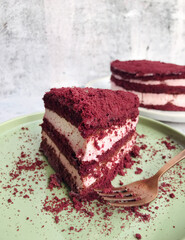 Red velvet cake, classic three layered cake from red butter sponge cakes with cream cheese 