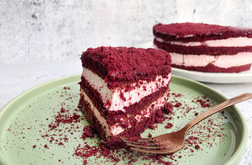 Red velvet cake, classic three layered cake from red butter sponge cakes with cream cheese 