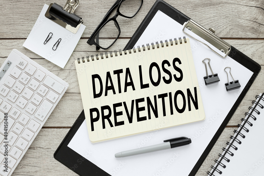 Poster data loss prevention notepad with text on black folder with clip