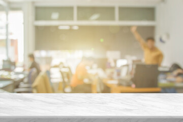 White marble table top and blurred abstract background from interior building office backdrop with desk blur.
