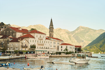 Perast, Montenegro - May 27, 2021: Historic city of Perast in the Bay of Kotor in summer at sunset