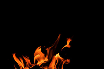 Close up burning flames on black background for graphic design or wallpaper
