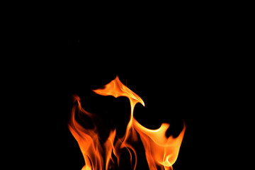 Close up burning flames on black background for graphic design or wallpaper