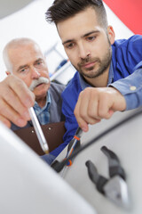 an apprentice tradesman under supervision