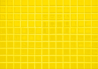 Yellow ceramic wall and floor tile abstract background. Design geometric mosaic texture for backdrop hospital wall, canteen and kitchen.
