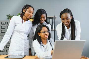 Fototapeta premium Medical Team Discussing Treatment Options With Patients