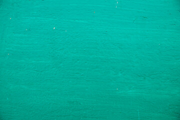 Old green metal background. Uneven surface and texture.