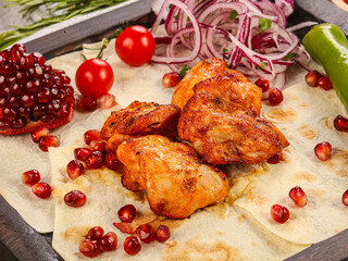 Chicken hip barbecue served onion