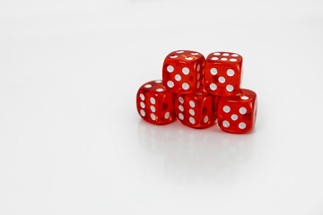 Five red glass dice isolated on white background. Casino, gambling concept
