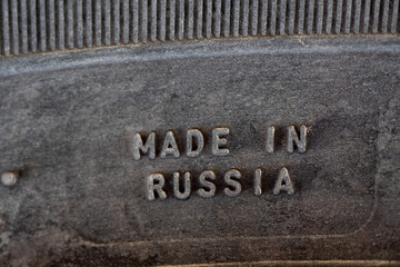 Made in Russia text on the car tyre