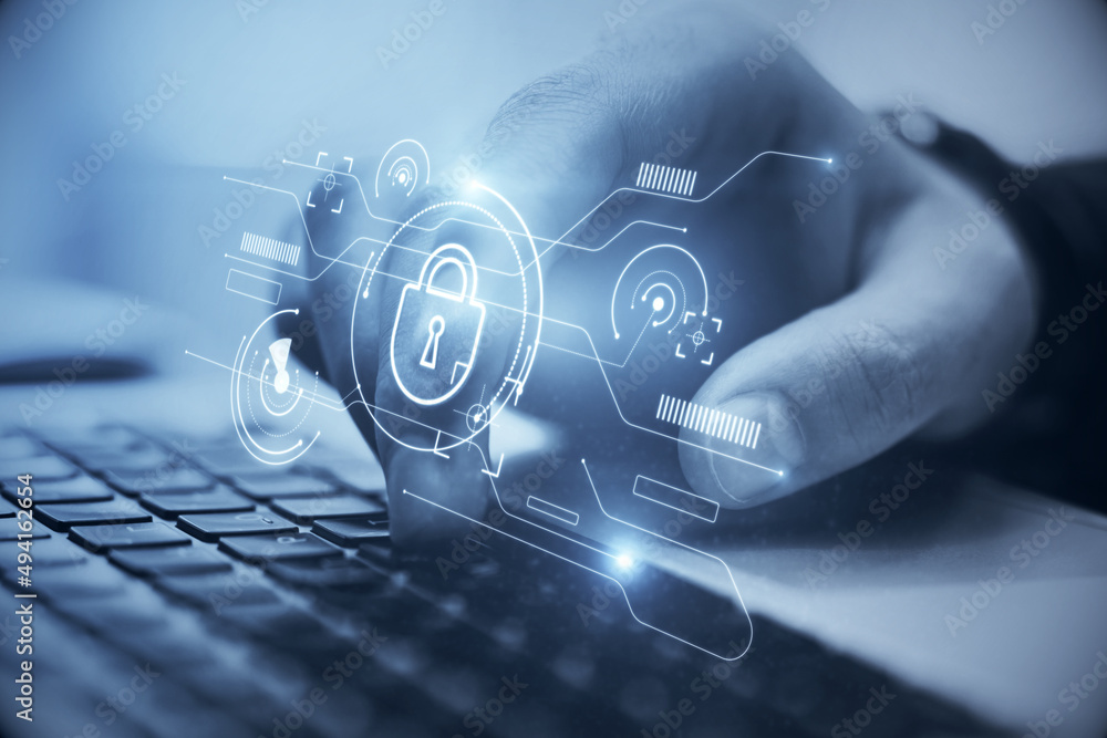 Aufkleber Close up of male hand using keyboard with abstract internet safety and security interface with padlock and business charts on blurry blue background. Secure and cyber concept. Double exposure.
