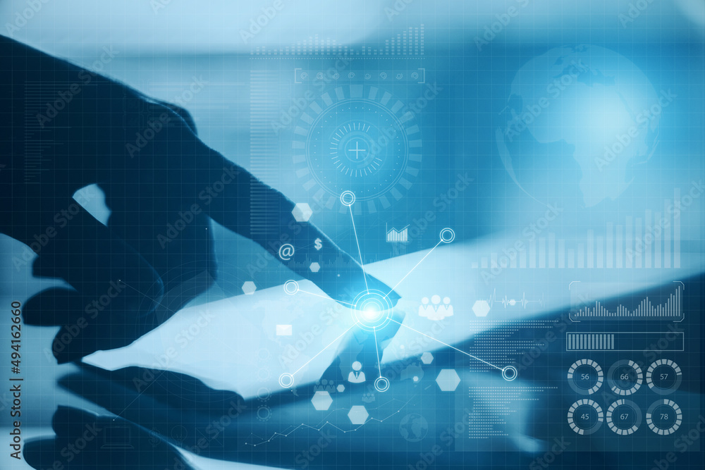 Aufkleber Close up of hand using tablet with abstract global digital business interface on blurry background. Interface, chart and hud concept. Double exposure.
