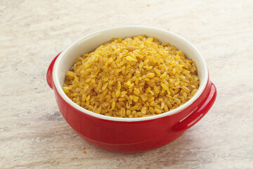Raw bulgur in the bowl