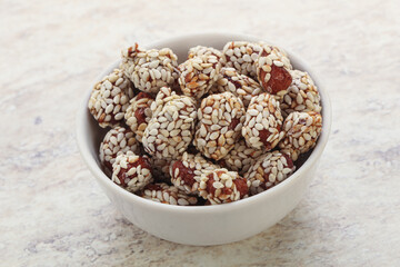 Sweet peanut in sesame seeds