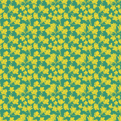 Cute seamless pattern with yellow blooming magnolias twigs on emerald background.