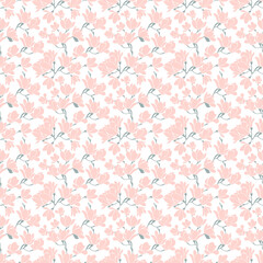 Cute seamless pattern with pink blooming magnolias twigs on white background