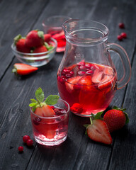 Glass of red cranberry and strawberry juice