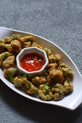 a plate of fried crispy broccoli 