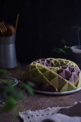 a whole cake in dark background   