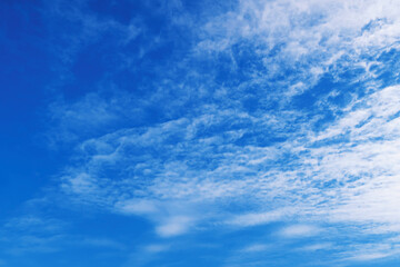 Fototapeta na wymiar Blue sky with spreaded white cloud in the winter day