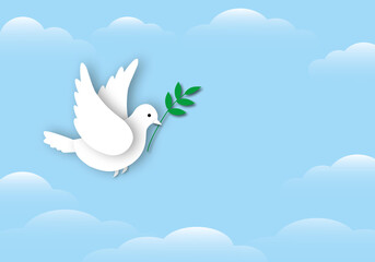 Paper white dove or pigeon carrying olive branch flying in cloudy sky background, Concept for World Peace Day, international day of peace, space for the text, paper cut design style.